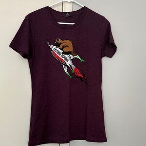 Next Level Apparel Women's Dark Plum Graphic Tee with Brown Beaver Rocket